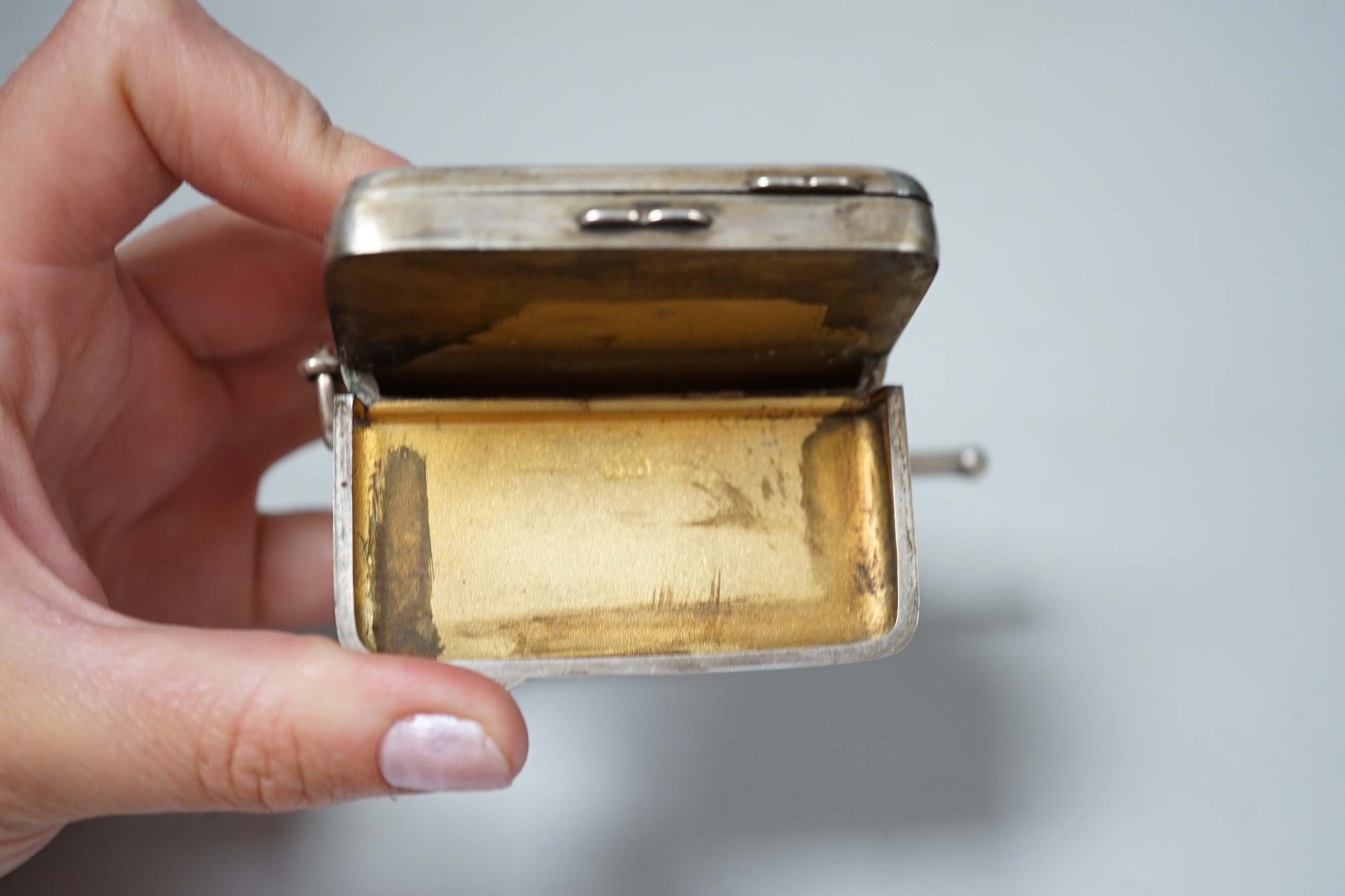 An Edwardian silver combination calling card, sovereign, vesta and pencil holder case, William Neale & Sons, Chester, 1904, 76mm.